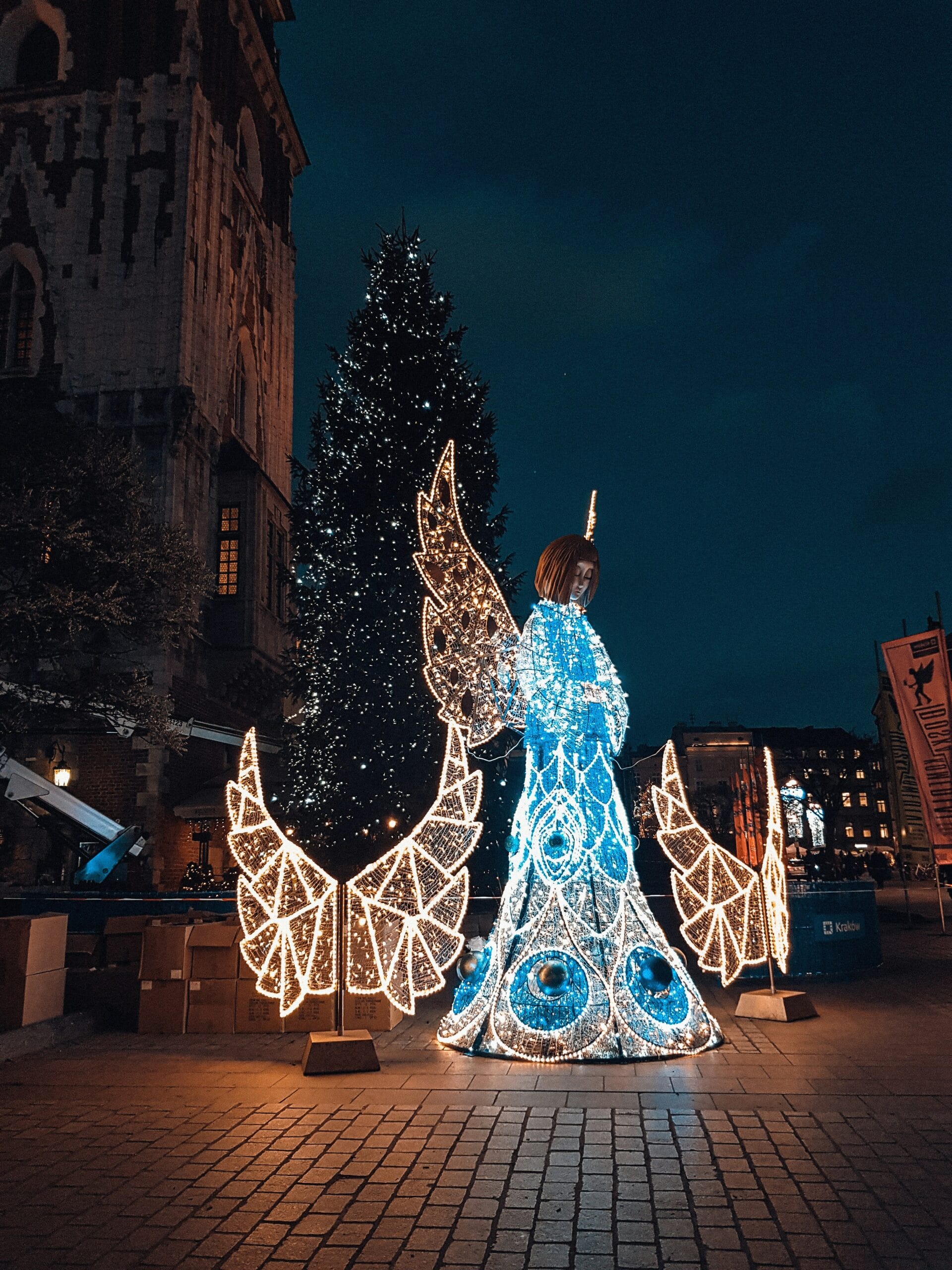 Krakow Market Square in winter with lights and historic buildings