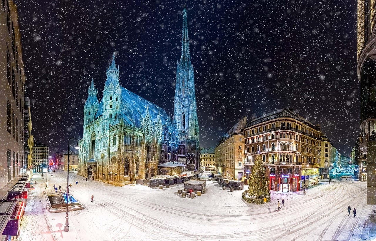 Vienna Rathaus and Christmas market lights in winter