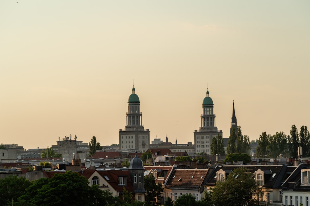 Twin towers dominate city skyline at sunset