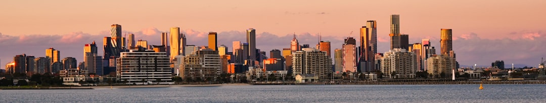 a view of a city skyline from across a body of water