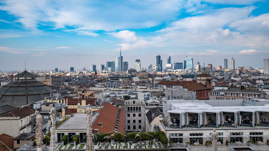 City skyline with modern skyscrapers and historic buildings.