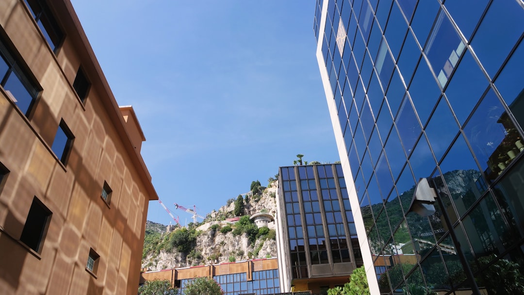 a view of a very tall building next to another building