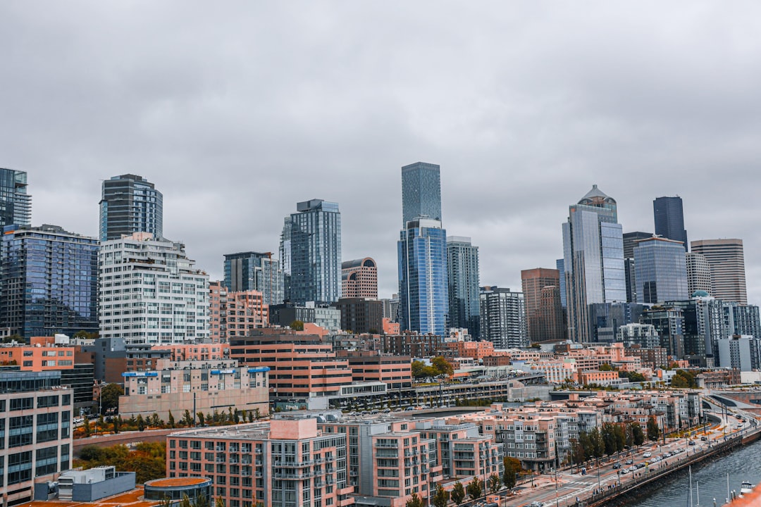 Seattle's modern skyline under a cloudy sky.